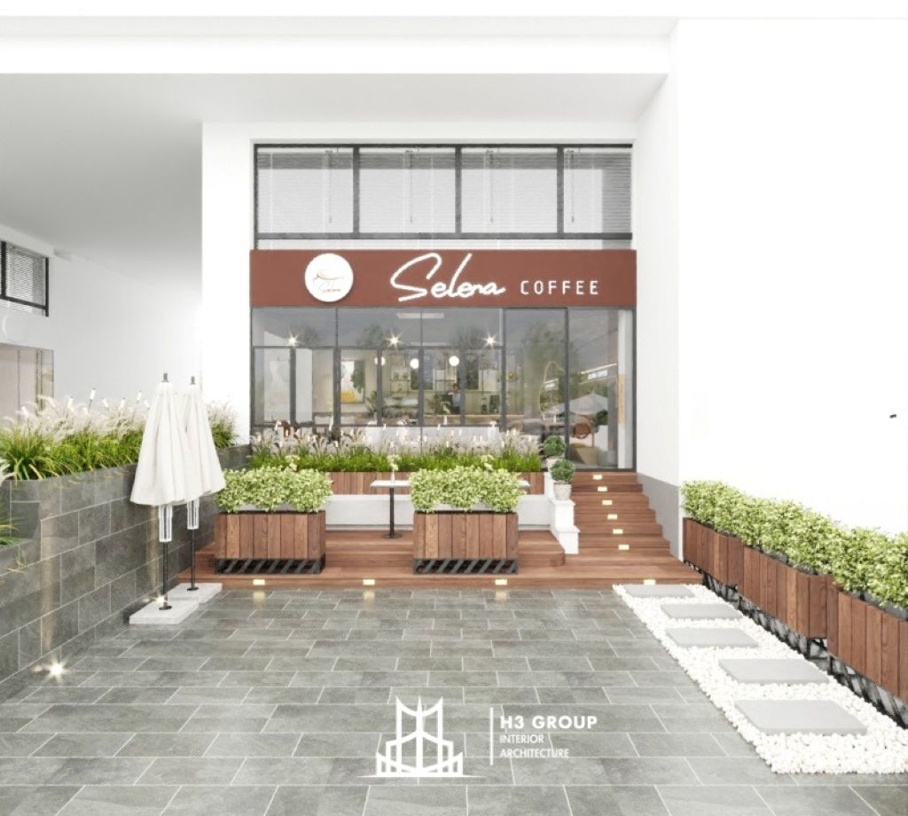 Dự án Selena Coffee do H3 Group thiết kế nổi bật với dàn cửa kính lớn đón ánh sáng tự nhiên, tạo cảm giác chiều sâu cho không gian quán dù mặt bằng nhà phố