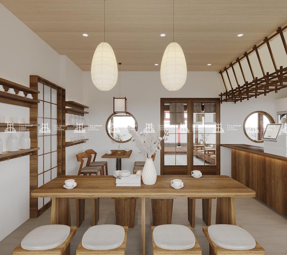 Phong cách thiết kế quán cafe Nhật Bản sử dụng màu kem chủ đạo kết hợp gam nâu từ bàn ghế gỗ, tạo nên tổng thể không gian tinh tế và thư thái