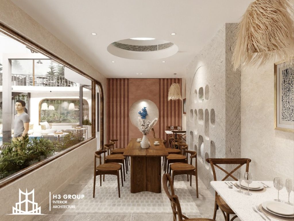 Thiết kế quán cafe phong cách Địa Trung Hải của H3 Group sử dụng bảng màu trung tính ấm áp, kết hợp chất liệu tự nhiên thô mộc đầy mộc mạc và tinh tế