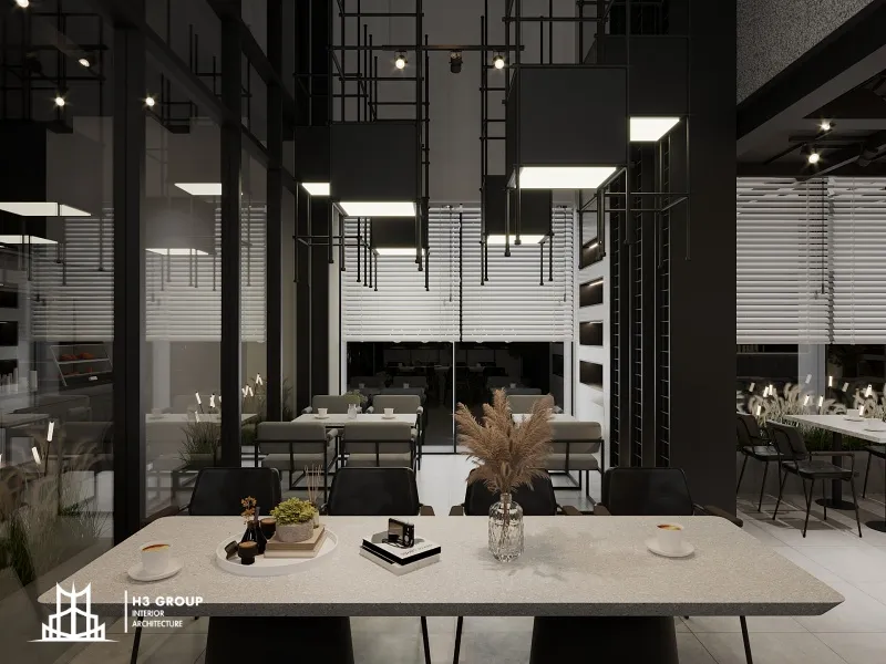Quán cafe phong cách tối giản với nội thất trắng xám, ánh sáng tự nhiên và nội thất đơn giản, tinh tế