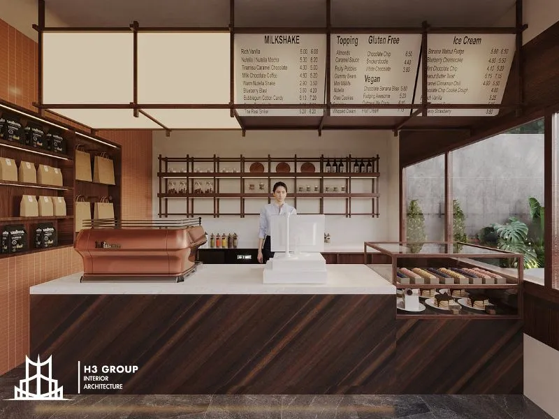 Quầy bar của dự án Trạm Sạc Coffee & cake shop là sự kết hợp hài hòa, ấn tượng giữa vật liệu gỗ và đá tự nhiên