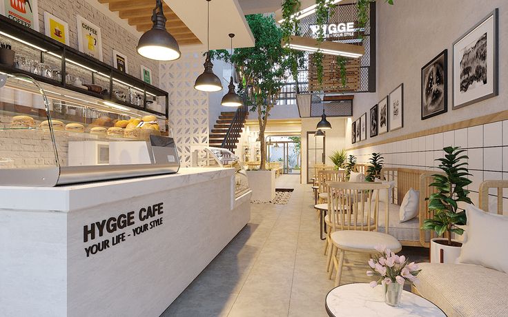 Quán Hygge Cafe với thiết kế trắng tinh khôi, tôn lên vẻ đẹp của tủ bánh