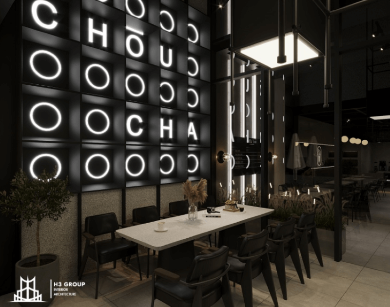 Thiết kế quán cafe nhà ống nhà ống phong cách Industrial sử dụng tông đen làm chủ đạo kết hợp với hệ thống đèn neon và ánh sáng ấn tượng