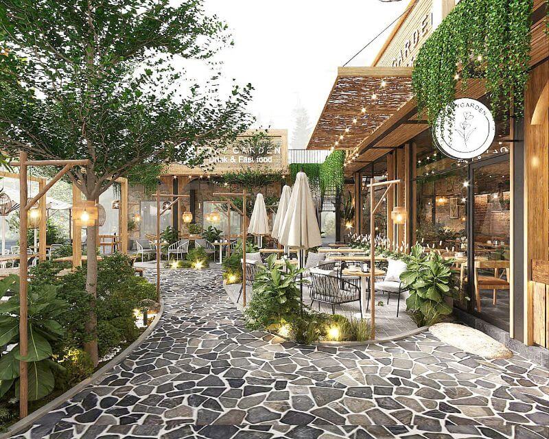 Quán cafe phong cách Tropical đặc trưng với không gian xanh ngát, ánh sáng tự nhiên, mô phỏng lại khu rừng vùng Nhiệt Đới