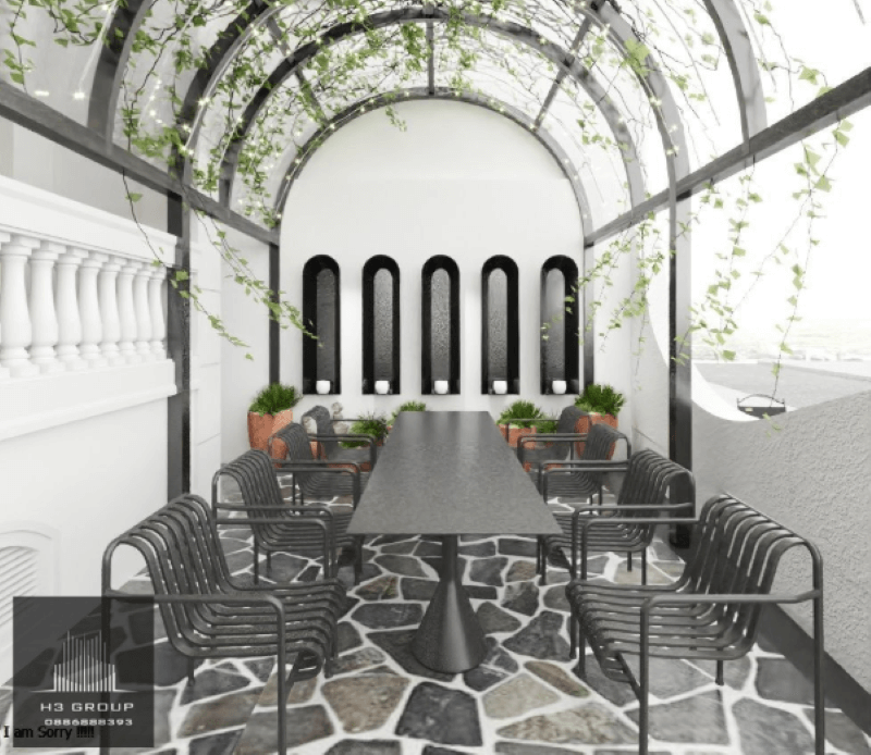 Khu vực mở của Tiệm Cafe Sidola nổi bật với mái vòm được tạo hình từ những thanh thép uốn cong tinh tế, tạo nên kết cấu vững chắc cho phần mái che bằng kính trong suốt, vừa đảm bảo kết cấu vừa tăng giá trị thẩm mỹ