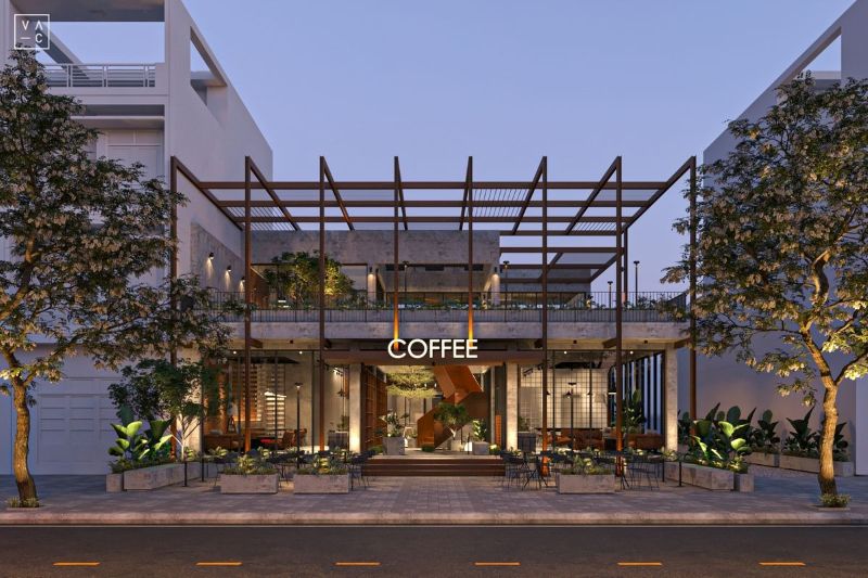 Quán cafe khung thép 2 tầng phong cách hiện đại dễ dàng nổi bật giữa khu phố nhờ thiết kế hình khối, gam màu trung tính và điểm nhấn xanh tự nhiên     