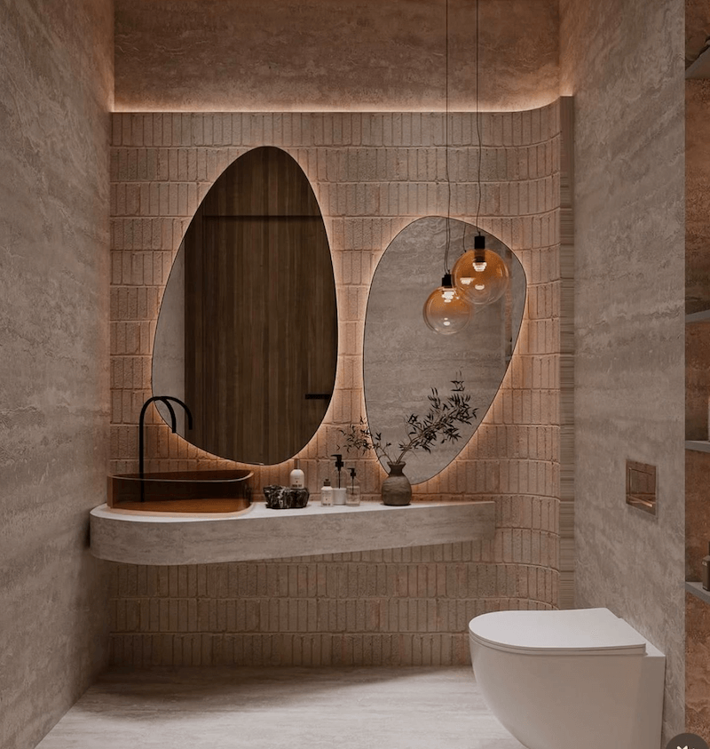Thiết kế nhà vệ sinh cao cấp với sự kết hợp tinh tế giữa các vật liệu cao cấp, ánh sáng gián tiếp và màu sắc trầm ấm, tạo nên một không gian đẳng cấp, sang trọng và đầy cuốn hút