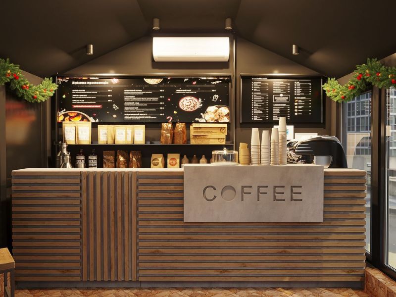 Quầy bar sử dụng gỗ công nghiệp với tông nâu sẫm, hạn chế sự biến đổi màu và gần như không có mắt gỗ, tạo cảm giác hiện đại và thống nhất trong thiết kế  