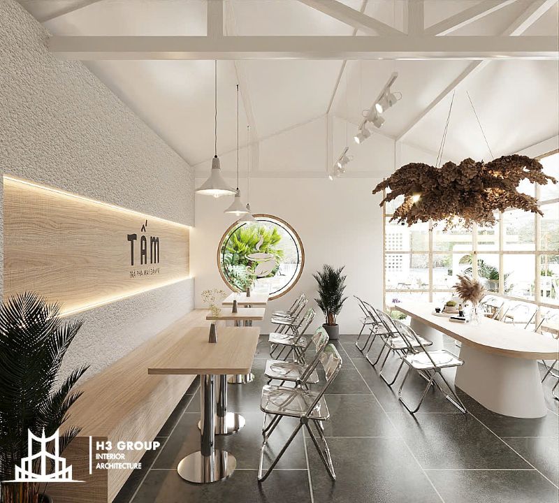 Thiết kế quán cafe nhỏ gọn, tận dụng tối đa những cửa kính lớn để lấy ánh sáng tự nhiên, tạo chiều sâu, tăng thêm phần thông thoáng.