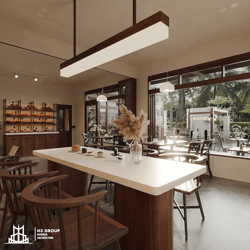 Mẫu thiết kế tận dụng mặt tiền lớn, kết nối trong - ngoài bằng cửa kính, mang đến cảm giác thông thoáng, gần gũi với thiên nhiên
