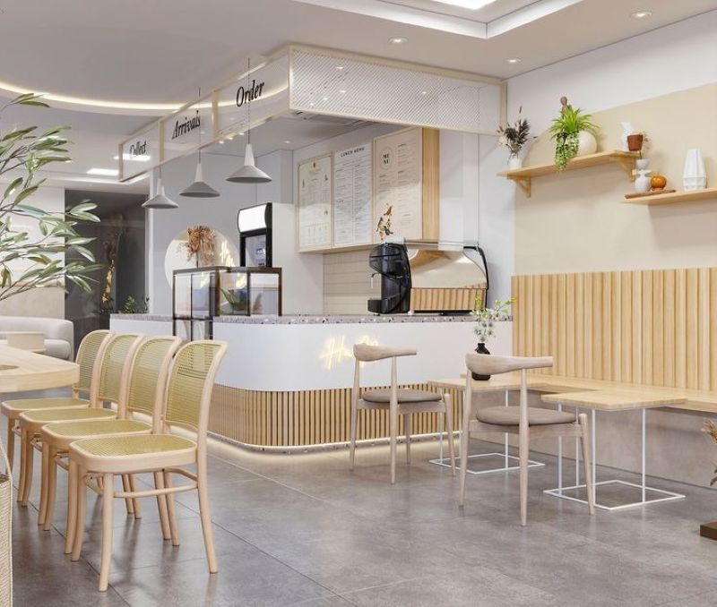 Quán sinh tố đẹp mắt với quầy pha chế mở, bảng menu rõ ràng và thiết kế ghế ngồi gọn gàng, tiện lợi 