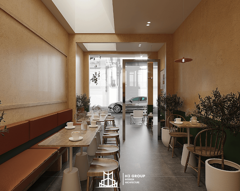 Quán cafe được thiết kế theo phong cách hiện đại với nội thất gỗ, gam màu trung tính, tạo không gian tối giản và ấm cúng