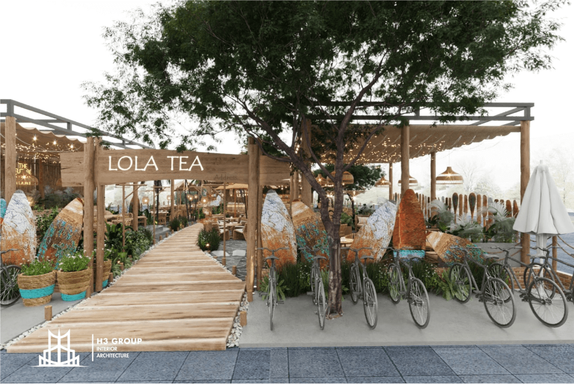 Quán cafe phong cách Industrial kết hợp hiện đại, cùng với tường thô, nội thất bọc nỉ ấm áp, cây xanh và giá sách, tạo không gian thư giãn, gần gũi