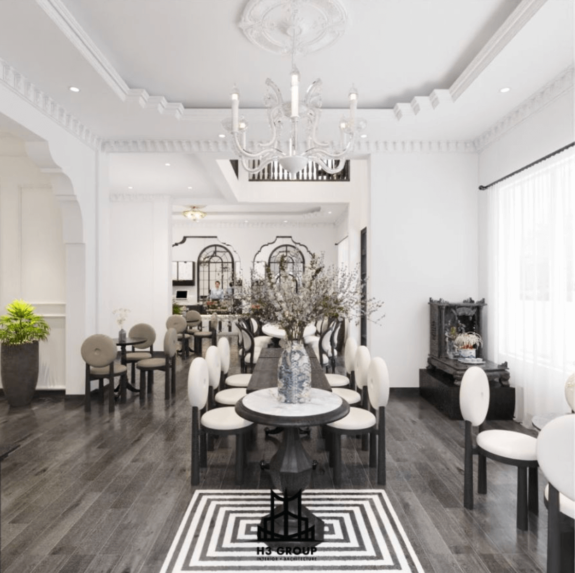 Thiết kế quán cafe theo phong cách tân cổ điển lịch lãm với đường nét mềm mại, màu sắc nhã nhặn, chi tiết trang trí tỉ mỉ và đèn chùm tinh xảo, tạo không gian vừa hoài cổ vừa sang trọng