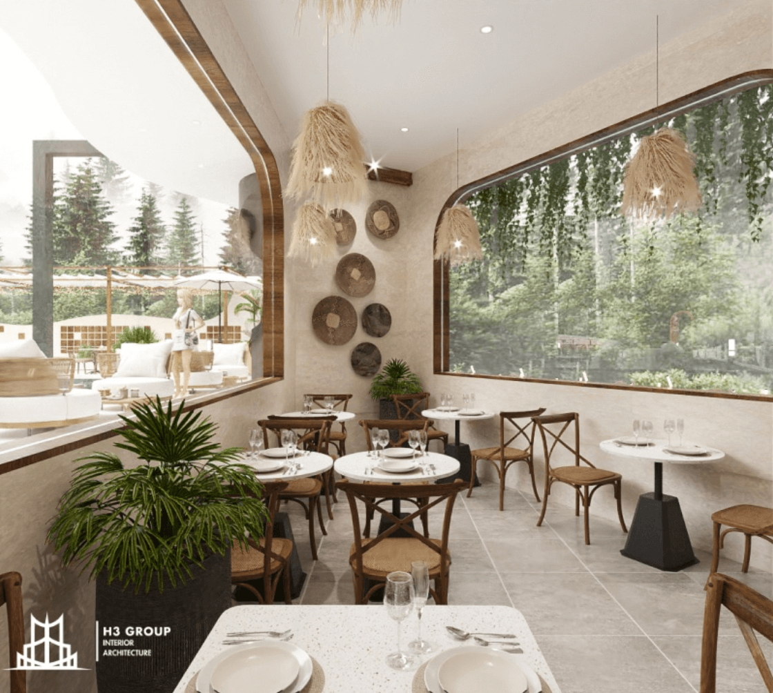 Thiết kế quán cafe Địa Trung Hải với tông màu trắng, nội thất hiện đại và chi tiết trang trí độc đáo, không gian mở rộng cùng cửa kính lớn tạo sự gần gũi thiên nhiên