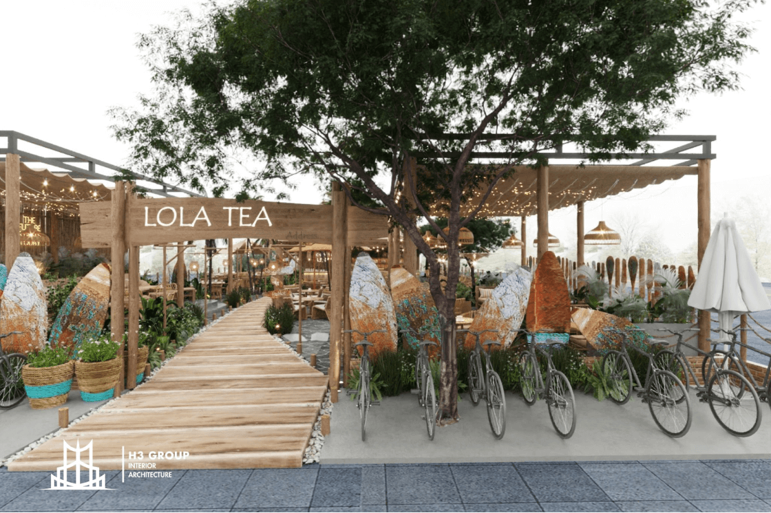 Thiết kế quán cafe theo phong cách Tropical, sử dụng gỗ tự nhiên và nhiều cây xanh cùng các chi tiết trang trí tạo nên một không gian ngoài trời thoáng đãng, mát mẻ và gần gũi với thiên nhiên nhiệt đới