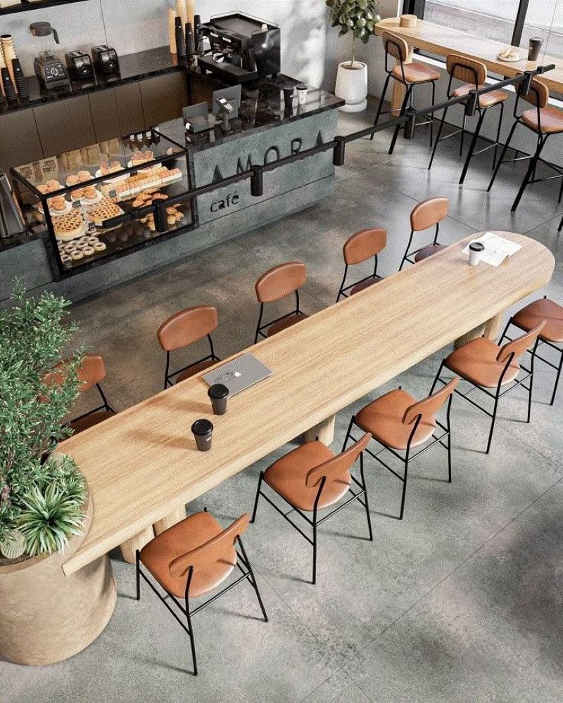 Thiết kế quán cafe văn phòng phong cách công nghiệp thường sử dụng ánh sáng đèn sợi đốt để tăng vẻ ấm áp và cá tính