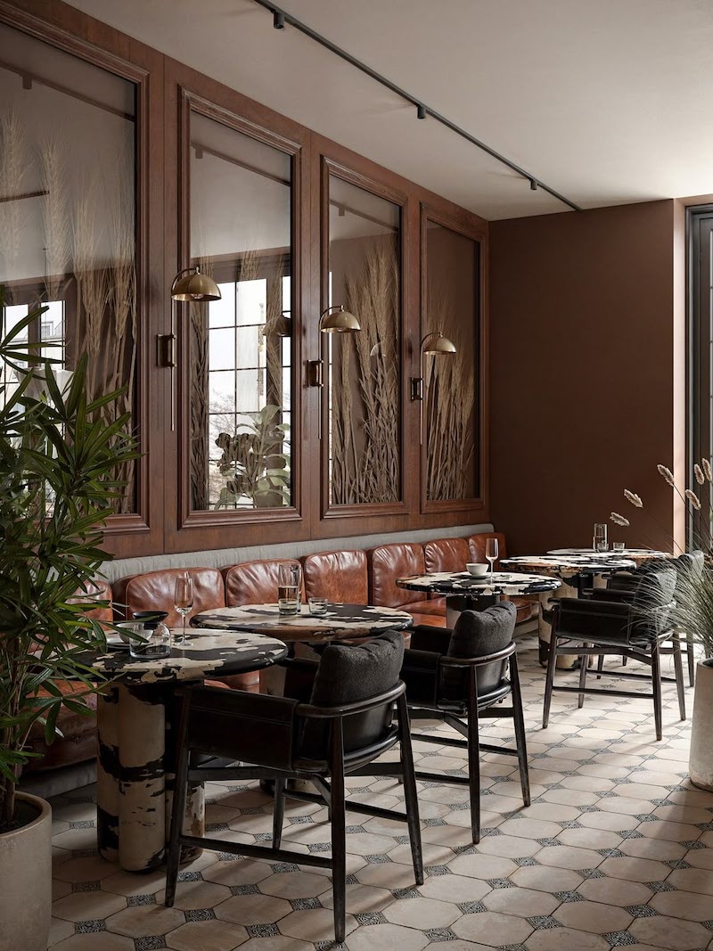 Nội thất nhà hàng Retro Pháp sử dụng ghế bọc nệm nhung, bàn gỗ tối màu và họa tiết tinh xảo để tạo cảm giác ấm cúng