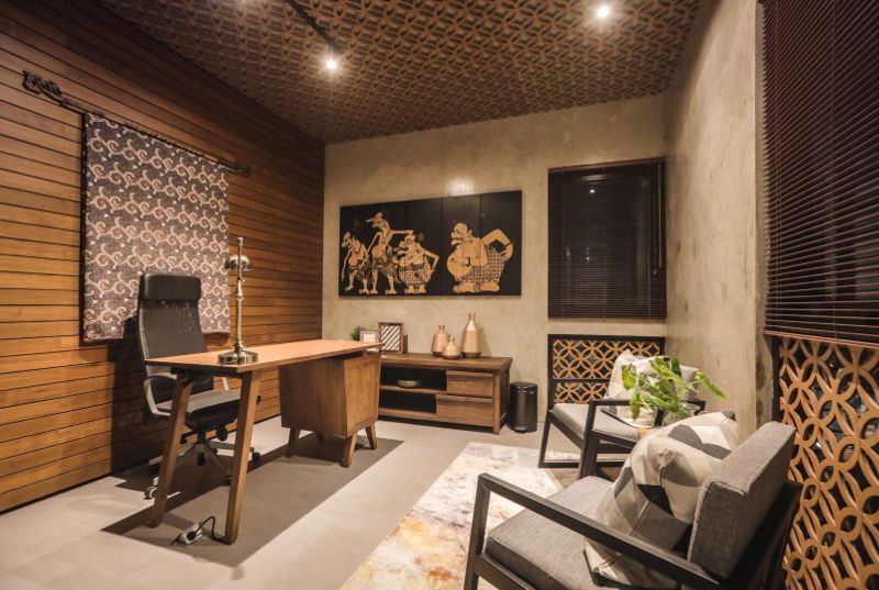 Thiết kế phòng làm việc phong cách Việt sử dụng vật liệu gỗ, tre, mây và đá tự nhiên để tạo cảm giác thư giãn và thân thuộc 