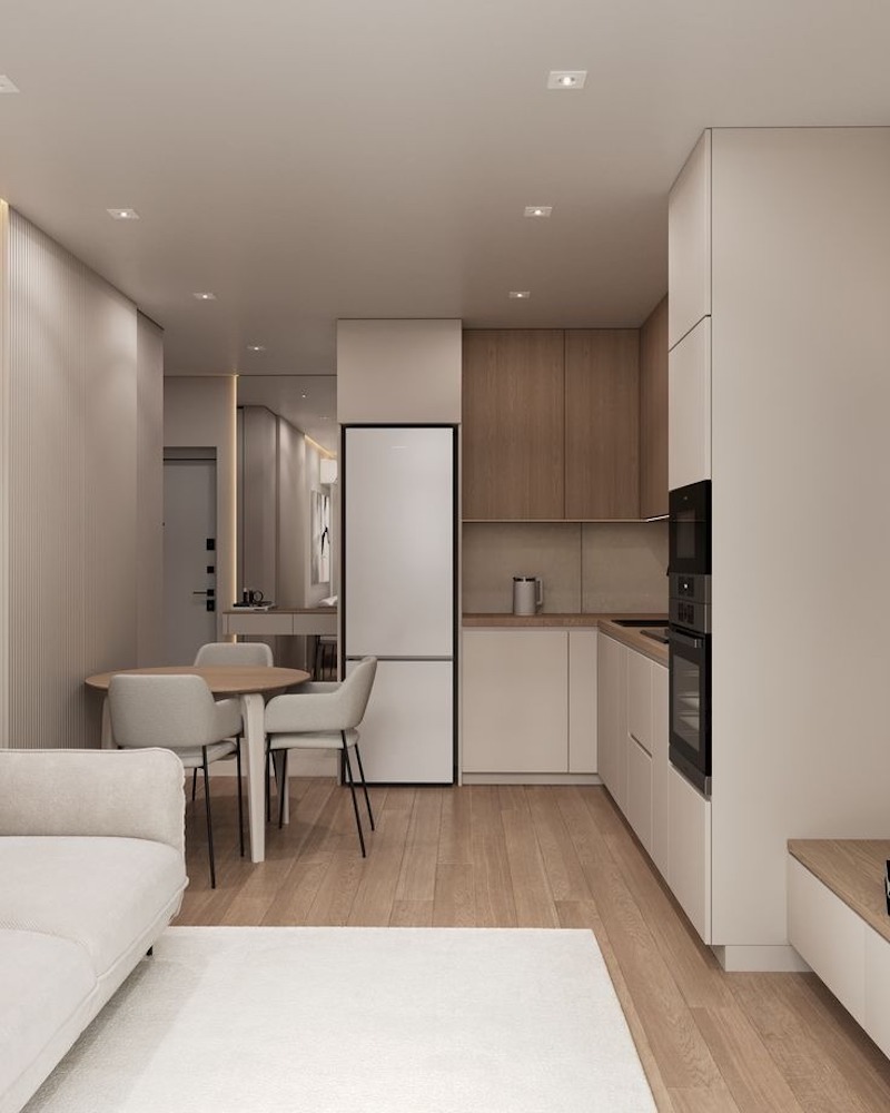 Việc hạn chế vật dụng trưng bày giúp phòng khách thông bếp dễ duy trì trạng thái sạch sẽ lâu dài