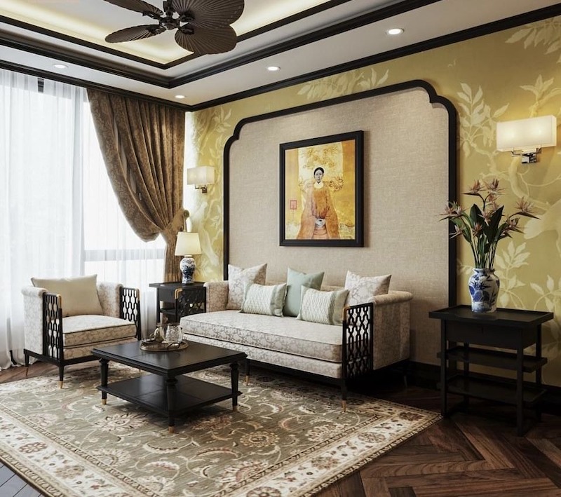Tranh decor nghệ thuật kết hợp ánh sáng vàng nhẹ, giúp phòng khách vừa sang trọng vừa gần gũi, đậm chất Indochine