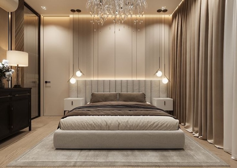Nội thất phòng ngủ đồng bộ với phòng khách, sử dụng vật liệu cao cấp và đường nét tinh giản, giữ tổng thể hài hòa, sang trọng