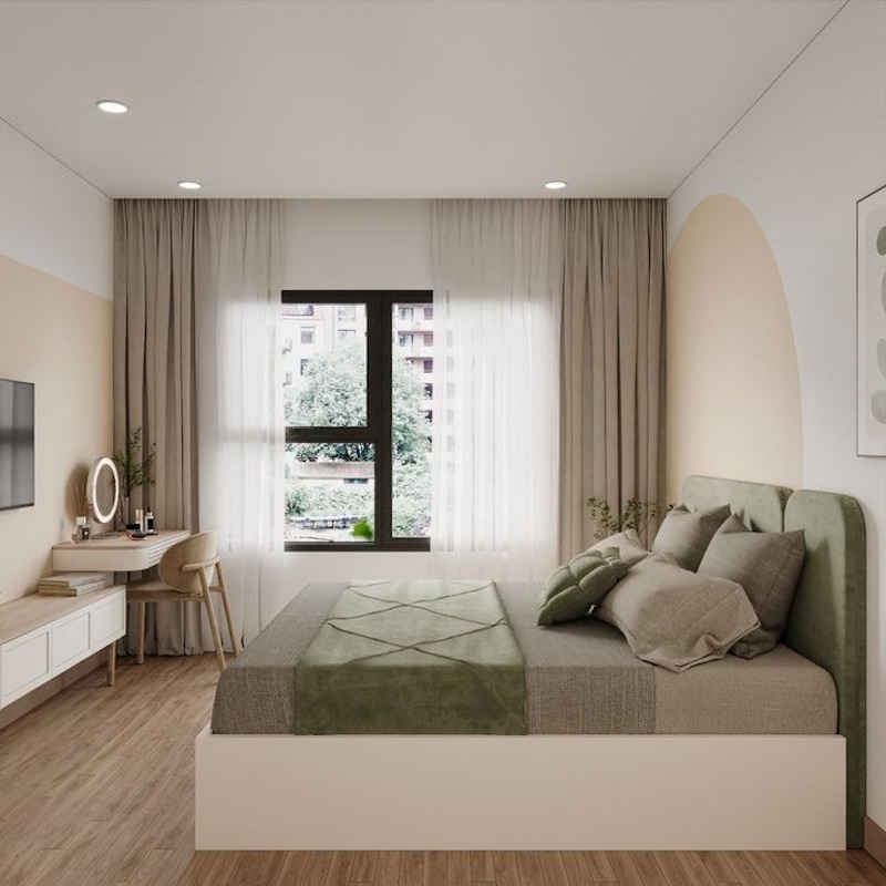 Phòng ngủ nhẹ nhàng với gam xanh - be, đón sáng tự nhiên từ khung cửa lớn giúp không gian luôn thoáng và dễ chị