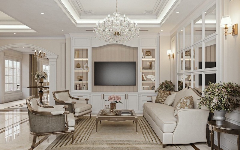 Sự kết hợp hoàn hảo giữa bộ sofa êm ái và ánh sáng lung linh từ đèn chùm pha lê mang đến vẻ đẹp sang trọng, vượt thời gian cho căn phòng