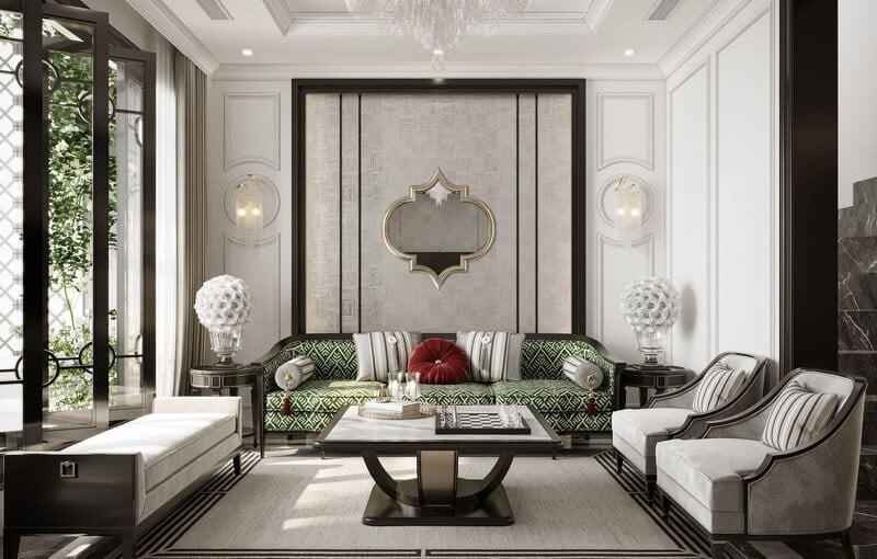 Góc phòng khách Indochine đầy tinh tế với sự pha trộn giữa đường phào chỉ tường phương Tây và họa tiết truyền thống Á Đông trên gối tựa và ghế sofa