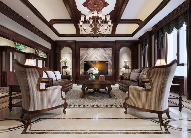 Nội thất phòng khách Đông Dương cao cấp sử dụng bộ sofa da kết hợp ghế bành họa tiết răng sói (houndstooth) và nền gạch bông đá hoa văn đối xứng đặc trưng