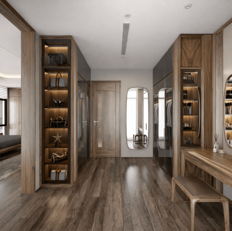 Hệ tủ gỗ kết hợp cánh kính và đèn hắt âm giúp tăng khả năng lưu trữ, dễ quan sát và giữ không gian luôn sang trọng, ngăn nắp