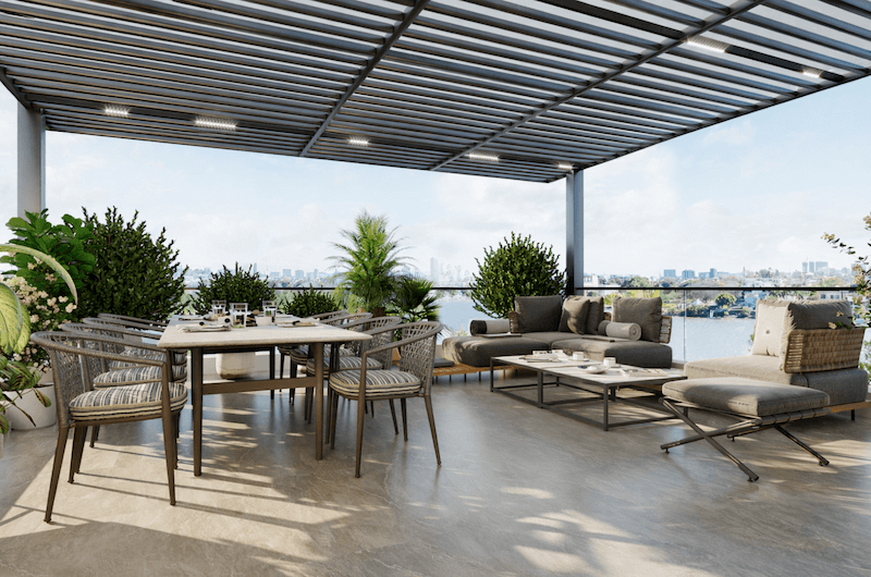 Sân thượng mở với hệ pergola kim loại, bố trí khu bàn ăn và lounge ngoài trời để tạo nơi thư giãn, tiếp khách lý tưởng giữa thiên nhiên