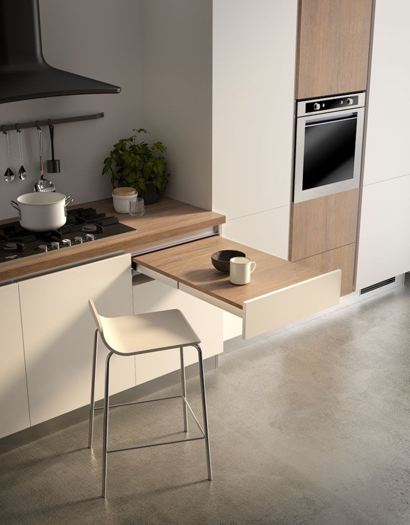 Nếu không muốn bị chiếm diện tích bởi chiếc bàn ăn, một chiếc tủ bếp tích hợp thông minh với bàn ăn sẽ là giải pháp tuyệt vời cho bạn