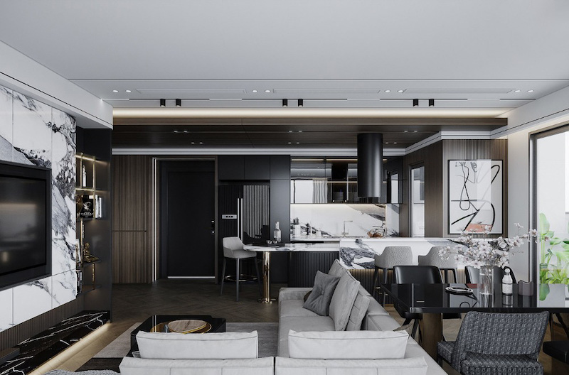 Căn hộ sử dụng bảng màu trung tính kết hợp hệ thống đèn hắt và đèn ray nam châm hiện đại để tạo chiều sâu mà không cần trang trí rườm rà