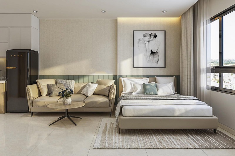 Thiết kế căn hộ Studio 45m2 này tối ưu hóa diện tích bằng cách bố trí mở, đặt sofa và giường ngủ song song trên cùng một trục tường để tạo sự thông thoáng