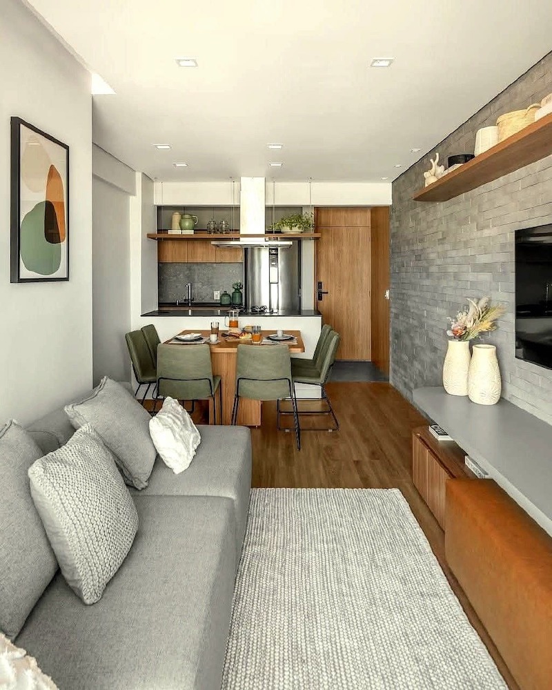 Gam màu trắng chủ đạo kết hợp điểm nhấn xám ghi giúp căn hộ 50m2 duy trì vẻ đẹp tinh tế, bền vững và không bao giờ lỗi mốt theo thời gian 