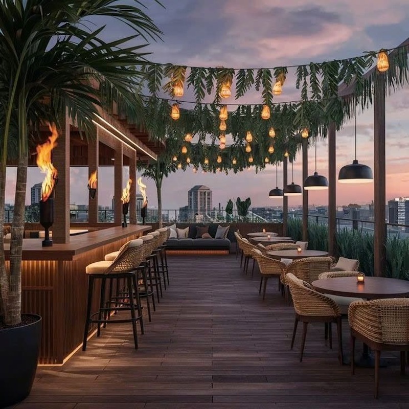 Tận dụng view thành phố từ trên cao, kết hợp gió trời và cây xanh nhiệt đới tạo không gian thư giãn 