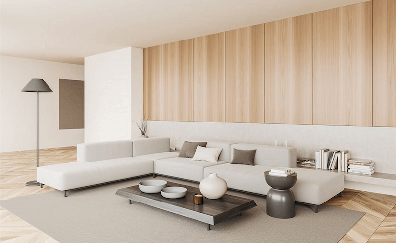 Một bộ sofa chữ L hoặc chữ I kê sát tường không chỉ mang lại sự bề thế mà còn giúp mở rộng tầm nhìn tối đa