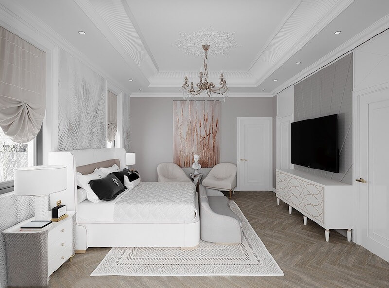 Phòng ngủ biệt thự với bố cục cân đối, gam màu trắng - xám chủ đạo, nội thất bo cong mềm mại và ánh sáng dịu, mang lại cảm giác sang trọng, yên tĩnh và thư giãn
