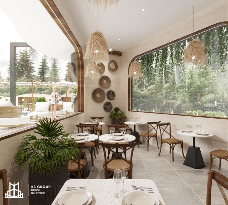 Phong cách Bắc Âu với gỗ mộc, màu trắng be, đường cong mềm mại, nhiều cây xanh và ánh sáng tự nhiên, tạo sự ấm áp và thư thái