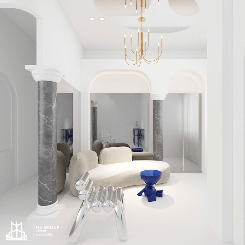 Quán cafe phong cách Industrial kết hợp hiện đại, cùng với tường thô, nội thất bọc nỉ ấm áp, cây xanh và giá sách, tạo không gian thư giãn, gần gũi