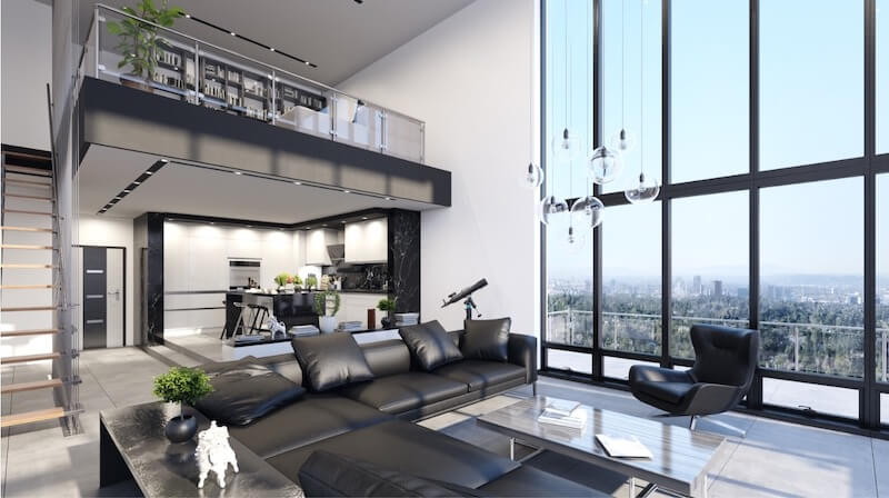 Sofa da đen module, đèn thả thủy tinh thổi tay, bàn trà kim loại tối giản và kính panorama kịch trần tạo nên dấu ấn cá nhân mạnh mẽ của gia chủ yêu phong cách đương đại 