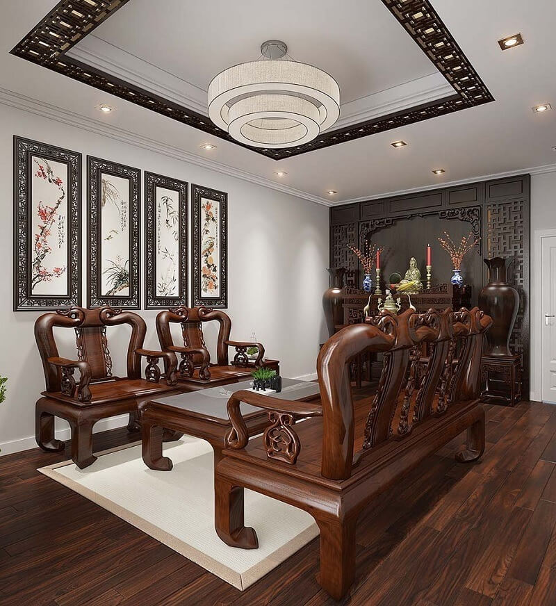 Không gian phòng thờ trang nghiêm với gỗ tự nhiên chạm khắc tinh xảo, bàn thờ bố trí cân đối, tranh thủy mặc và ánh sáng ấm tôn vẻ tĩnh tại, thành kính