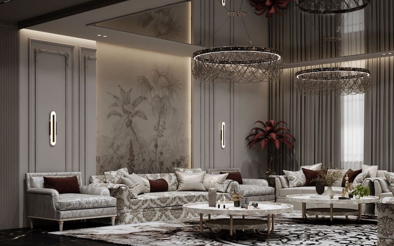 Phào chỉ mềm mại kết hợp sofa bọc họa tiết thanh nhã và ánh sáng dịu tầng lớp, tạo nên phòng khách mang vẻ sang trọng, ấm áp, đậm chất biệt thự cao cấp