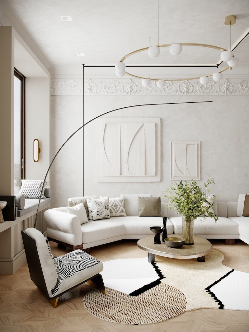 Phòng khách mềm mại với sofa bo cong, bảng màu trung tính và ánh sáng tự nhiên chan hòa, mang lại trải nghiệm thư giãn tinh tế, hiện đại mà vẫn ấm áp