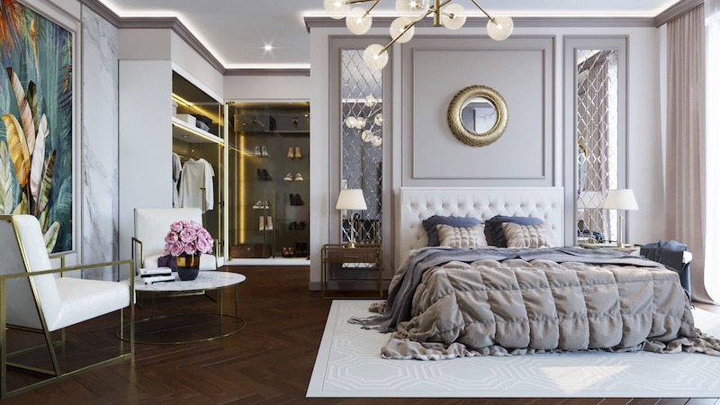 Walk-in closet cánh kính viền kim loại ánh vàng được tích hợp khéo léo, vừa tăng tính tiện nghi, vừa tạo điểm nhấn sang trọng cho tổng thể không gian nghỉ ngơi