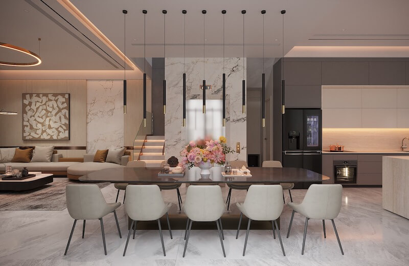 Không gian bếp ăn hiện đại với bảng màu trung tính, đá marble vân mây sang trọng, đèn thả tối giản và bố cục mở tạo cảm giác ấm cúng, tinh tế, tiện nghi