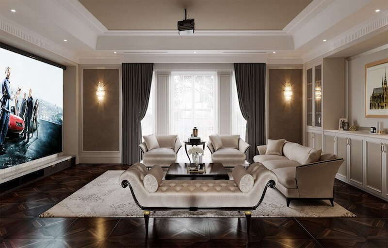 Phòng giải trí phong cách tân cổ điển với gam màu trung tính ấm, nội thất bọc nệm sang trọng, bố cục đối xứng và màn chiếu lớn tạo cảm giác riêng tư, đẳng cấp