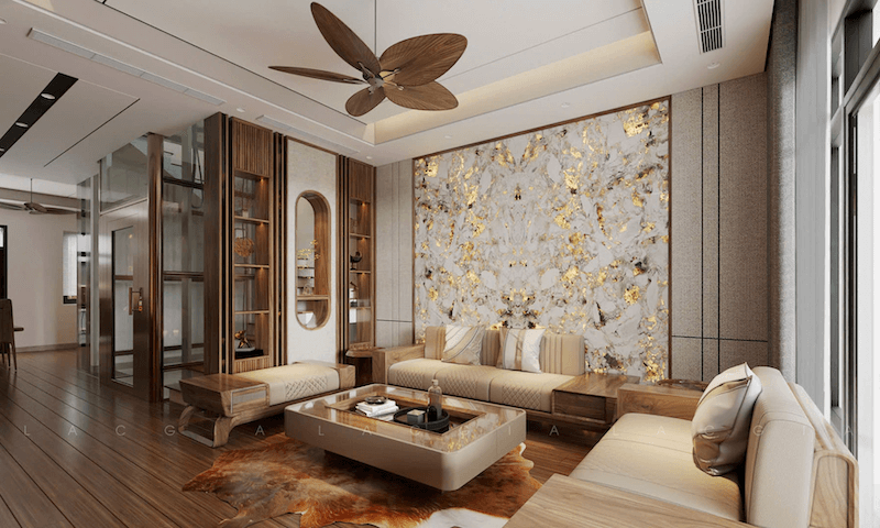 Phòng khách hiện đại pha chất Á Đông với vật liệu gỗ tự nhiên, mảng đá vân vàng nổi bật, nội thất tối giản và ánh sáng ấm tạo cảm giác sang trọng, thư thái
