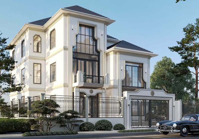 Khối nhà cao ráo, cửa kính lớn và phào chỉ tinh giản kết hợp lan can kim loại đen, tạo cảm giác sang trọng, cân đối và hiện đại giữa cảnh quan xanh